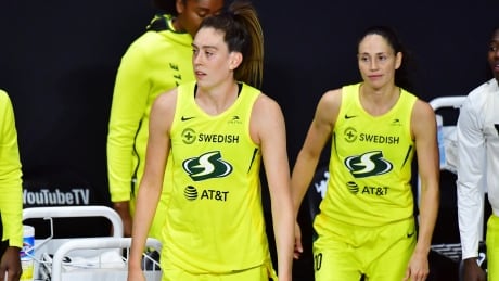 Seattle Storm forward Breanna Stewart, left, and guard Sue Bird step onto the court during their team's 93-80 win over the Las Vegas Aces in Game 1 of the WNBA Finals on Friday. 1278166588