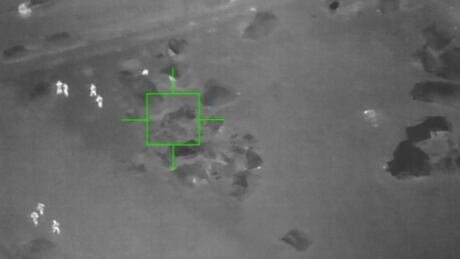 An image from a Vancouver police drone equipped with thermal imaging shows officers searching Oppenheimer Park during the police response to a non-fatal shooting at the park, Dec. 12, 2019. The footage was obtained by CBC News through a freedom of information request. VPD drone imaging