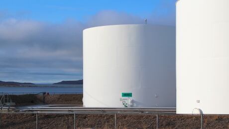 Large tanks hold diesel and other fuels at a tank farm on the shores of Pelly Bay, just outside Kugaaruk, Nunavut, pictured on Sept. 30, 2020. Diesel fuel tanks in Kugaaruk, Nunavut
