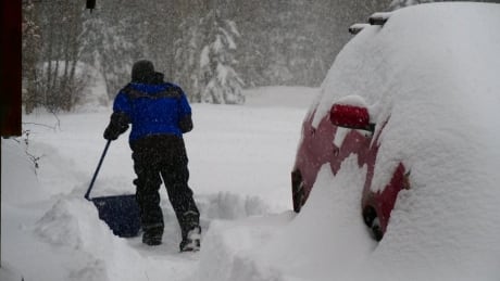 Digging out during a heavy snowfall in Whitehorse. Whitehorse snow