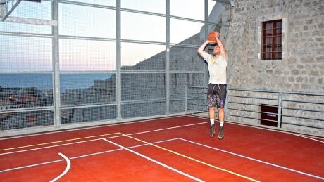 Justin Lee and his brother Brendan played basketball in more than 30 countries including Dubrovnik, Croatia. Justin Lee in Croatia