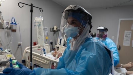 HOUSTON, TX - NOVEMBER 10: (EDITORIAL USE ONLY) Medical staff members treat a patient suffering from coronavirus in the COVID-19 intensive care unit (ICU) at the United Memorial Medical Center (UMMC) on November 10, 2020 in Houston, Texas. According to reports, COVID-19 infections are on the rise in Houston, as the state of Texas has reached over 1,030,000 cases, including over 19,000 deaths. 1229570174