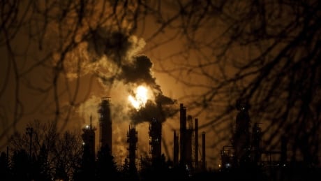 A flare stack lights the sky from the Imperial Oil refinery in Edmonton on Dec. 28, 2018. Oilpatch Jobs 20190408
