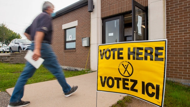4 questions answered about how to vote in the upcoming provincial election; A resident arrives to vote in the New Brunswick provincial election at St\. Mark's Catholic Church in Quispamsis, N\.B\. on Monday, Sept\. 14, 2020\. Premier Blaine Higgs, the Progressive Conservative leader, called the first provincial election during the COVID-19 pandemic after the opposition Liberals wouldn't support a plan that would have allowed his government to stay in power until October 2022 or until the end of the pandemic\. 