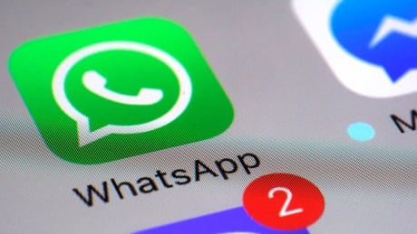 FILE - This Friday, March 10, 2017, file photo shows the WhatsApp communications app on a smartphone, in New York. In early January 2021, encrypted messaging apps Signal and Telegram are seeing huge upticks in downloads from Apple and Google's app stores, while WhatsApp's growth is on the decline following a privacy fiasco where the company was forced to clarify a message it sent to users. (AP Photo/Patrick Sison, File) Signal-Telegram-WhatsApp