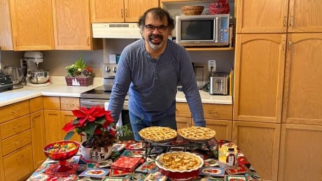 Alcide Punko has been baking for many years. He says this recipe took a long time to master. Alcide Punko with his bannock apple pies