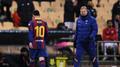 Lionel Messi, left, faces suspension after swinging towards the head of Asier Villalibre and hitting him, near the end of Barcelona's 3-2 loss against Athletic Bilbao on Sunday. Lionel-Messi-red-card-170121
