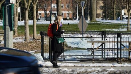 A woman walks down the street in downtown London, Ont., in January 2021.
Taken on January 7, 2021. covid london