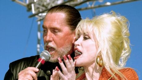 Dolly Parton said her brother and singing partner Randy Parton, left, has died of cancer. She said in a statement released Thursday that her brother sang, played guitar and bass in her band, as well hosting his own show at her theme park, Dollywood, in East Tennessee. Obit Randy Parton