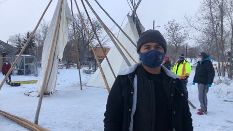 Rylee Nepinak is the co-founder of Anishiative, a volunteer youth group. He helped secure the space at the Thunderbird House and is volunteering to keep the site warm for visitors. Rylee Nepinak