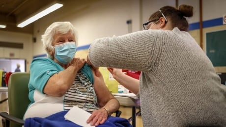 Booking system strained, but Alberta starts vaccinating seniors in latest phase of COVID-19 response