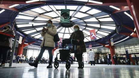 Montreal's vaccination campaign is in full swing, but it will likely be some time before the Quebec government relaxes public health restrictions in the region. COVID Que 20210303