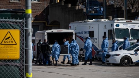 Members of the Toronto police forensics team conduct an investigation at the Commissioners Street Transfer Station on Thursday, March 4, 2021. COVID-19 HUMAN REMAINS POLICE SEARCH