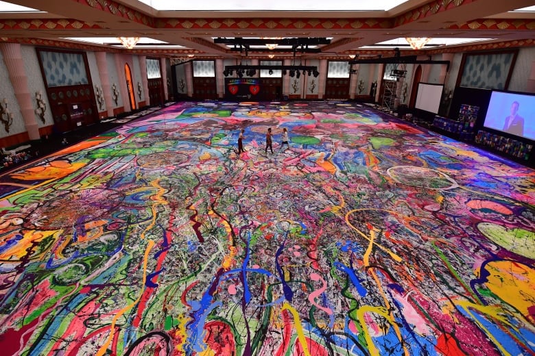 World s largest painting the size of 10 tennis courts sells