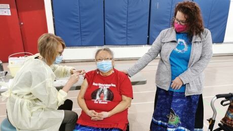 Lillian Piapot, Kookum at the Wellness Warrior Program, is nervous to receive a COVID-19 vaccine. Dr. JoLee Sasakamoose from the Wellness Wheel (right) supports Piapot. Historically, Indigenous people have been vaccinated without informed consent, says the Wellness Wheel.
Lillian Piapot