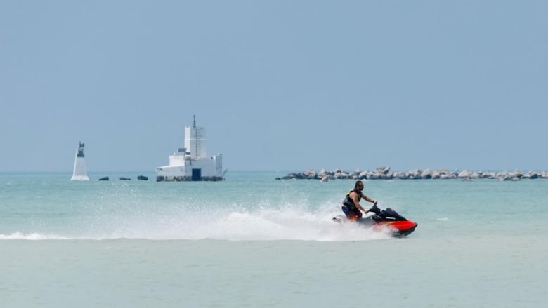 The main beach at Goderich has been busy this year. While good weather has played a part, tourism officials say local attractions are maybe being helped by Canadians choosing to vacation north of the border this summer.