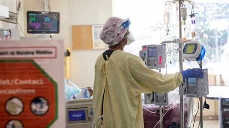An ICU nurse tends to a patient in the intensive care unit at Scarborough Health Network’s Centenary Hospital, in north-east Toronto, on Apr. 8, 2021. Centenary Hospital Covid Toronto