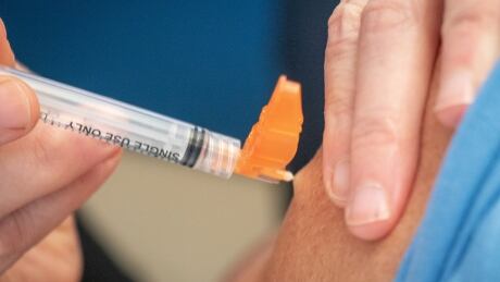 Halifax Nurse Danielle Sheaves first to receive the Pfizer-BioNTech Covid-19 vaccine in Nova Scotia. See close up of her getting injection in Halifax on 16 Dec 2020. First Covid Vaccine in Nova Scotia