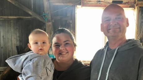 Taylor Levesque, centre, with baby Lillian and her honorary "stepdad," Glenn Fisher. taylor with glenn