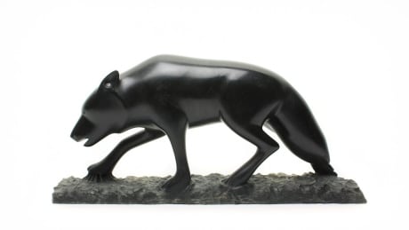This carving, which was being sold for $3,200, was one of two John Sabouring carvings stolen from a gallery in Edmonton last week. "Wolf Stalking" carving by John Sabourin