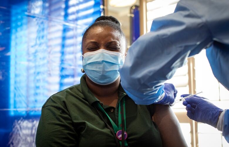 More than half of U.S. adults have gotten at least one dose of coronavirus vaccine, and more than a third have been fully vaccinated. That's compared to less than three per cent of Canadians who have received two doses. (Evan Mitsui/CBC)