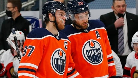 Connor McDavid, left, and Leon Draisaitl, right, would prefer to play in each of the Oilers' final three regular-season games. "They want to keep playing well and that will be our goal for the last three games," head coach Dave Tippett says. mcdavid-connor-draisaitl-210312-1180
