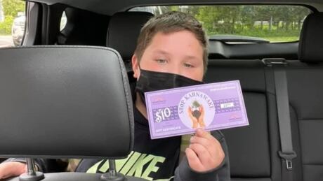 Cooper Rice, 10, was one of the first eight youth in Kahnawake to receive a gift certificate for following public health measures. Cooper Rice
