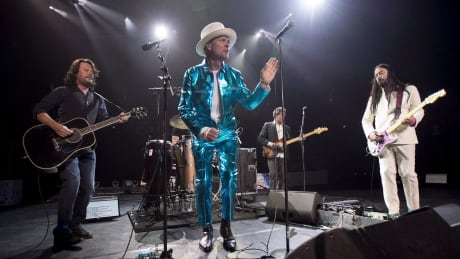 The Tragically Hip perform in Vancouver, Sunday, July, 24, 2016. While Canada's music industry continues to struggle in the midst of COVID-19, the Tragically Hip hope to offer some "Courage" by raising funds through a new face mask.  MUSIC Tragically Hip Masks 20200821