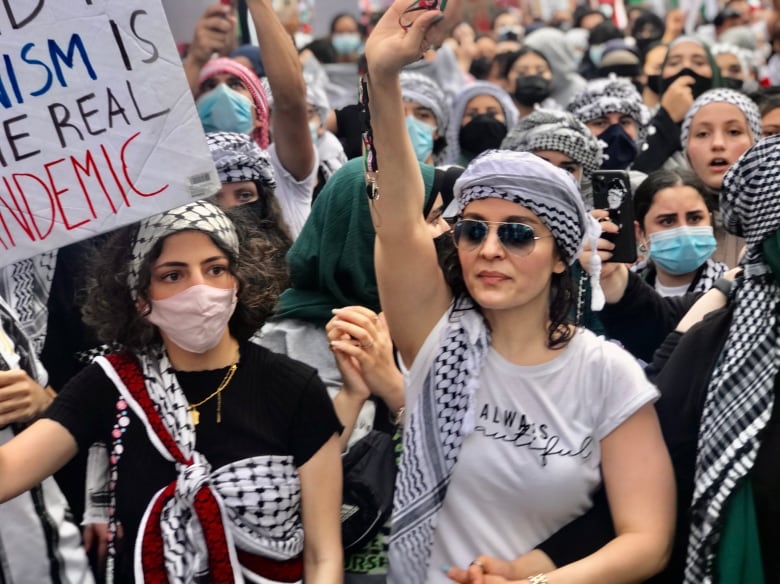 Protest in support of Palestinians fills Yonge-Dundas Square, moves to ...