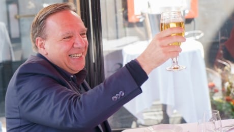 Quebec Premier François Legault was among those out celebrating the loosened public health restrictions on Friday in Outremont. COVID Que Legault 20210528