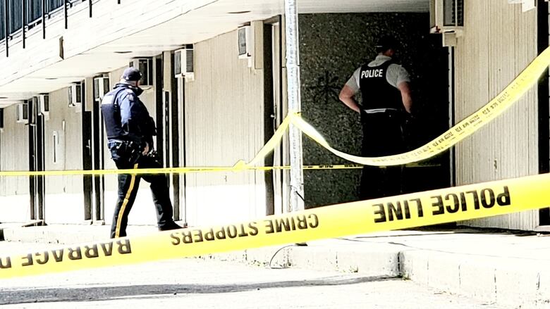 officers going into a building