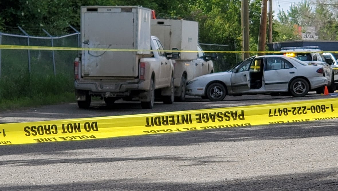 police tape near a parking lot