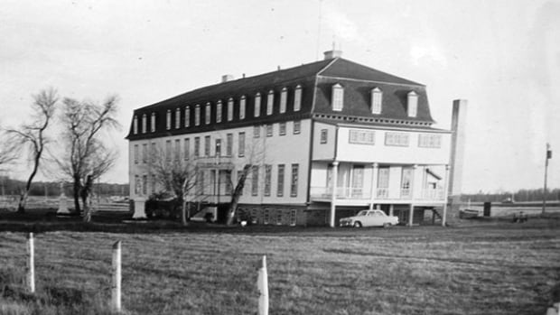 Retired priest charged with indecent assault after Manitoba residential school investigation