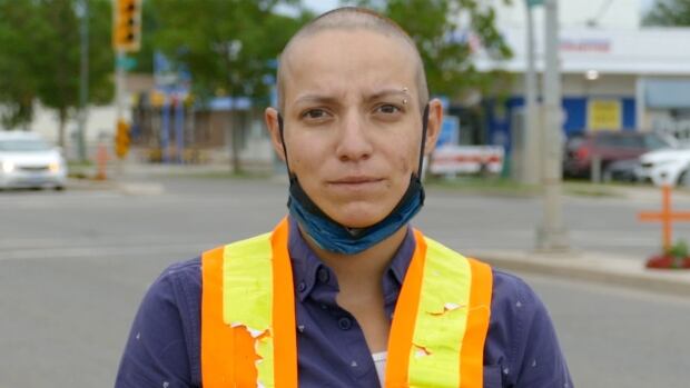 Granddaughter of residential school survivor lines Brandon streets with orange crosses