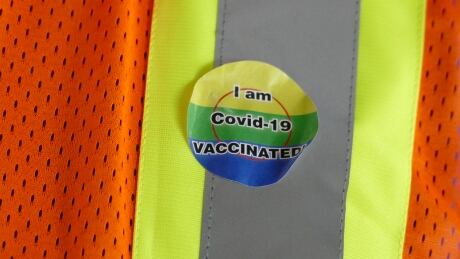 Sticker 'I am COVID-19 Vaccinated', at a Peguis First Nation pop up clinic, at the Assiniboia Downs site. Close-up view.
Taken 14-May, 2021 Peguis First Nation pop up clinic at Assiniboia Downs site