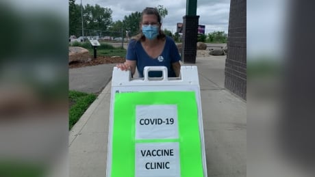 Standing outside of Station 20 West in Saskatoon after getting her second dose of COVID-19 vaccine, Cindy Hanson, a concerned citizen and a professor at the University of Regina, says it's critical for the province of Saskatchewan to be transparent and honest on how its vaccine rollout is going, as messaging from officials earlier in the rollout is no longer accurate. Cinday Hanson