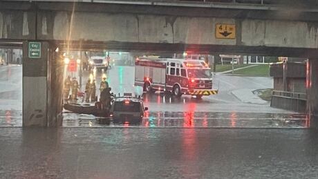 Regina Firefighters rescued a driver from a flooded overpass on Albert Street Friday morning. regina flooding