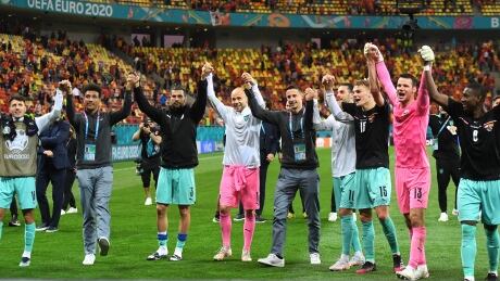 Austria's players celebrates after the UEFA EURO 2020 Group C football match between Austria and North Macedonia on Sunday. 1233434801