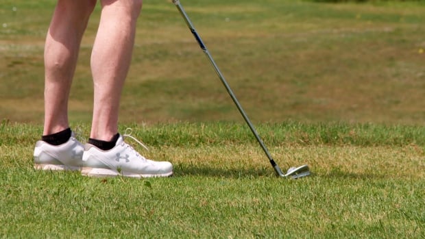 A golfer at Eagles Glenn of Cavendish prepares to take a shot as some P.E.I. golf courses see a surge in inquiries as the province opens up to eligible residents of Atlantic Provinces. Golf player tees up.