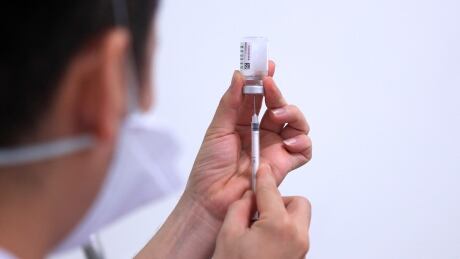Provincial officials said this week that they hope to include more family care practitioners in the immunization campaign in an effort to reach residents still without first doses and slowly shift away from mass clinics. health worker