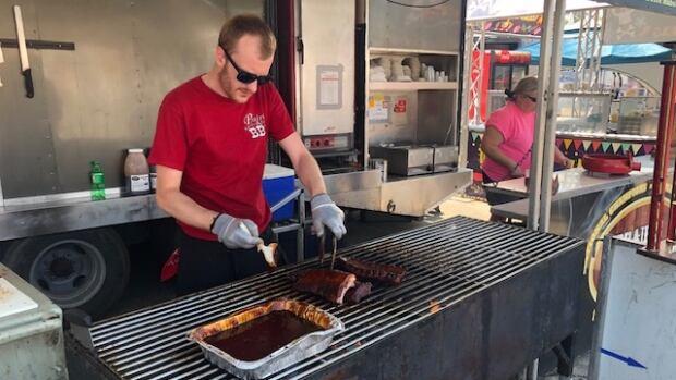 Longtime Calgary Stampede food vendors happy to be back despite smaller crowds