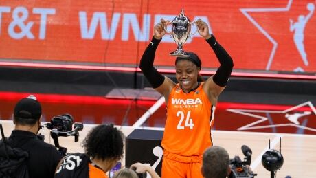 Arike Ogunbowale of Team WNBA holds up the MVP trophy after the 2021 WNBA All-Star Game at Michelob ULTRA Arena in Las Vegas, Nevada. Arike-Ogunbowale-140721