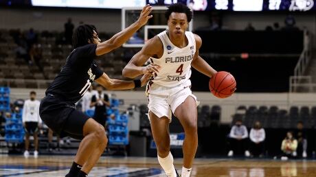 Florida State's Scottie Barnes drives the ball during NCAA action against Colorado. Barnes was named the Atlantic Coast Conference freshman of the year and is among the top prospects expected to be called at Thursday's draft. 1308528035