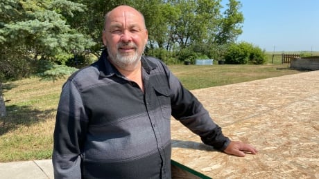 George Parker at the construction site of his new music studio at his home in Cando, Saskatchewan. George Parker