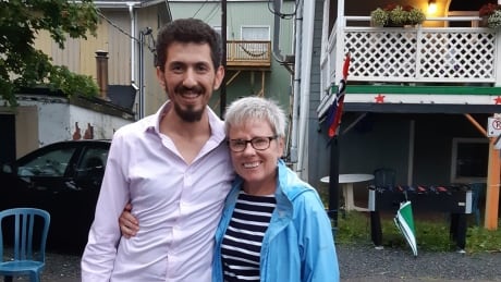 Mary-Beth Moriarity, minister at Pictou United Church and founding member of CAiRN, with Shadi AlaaEddin, who arrived in May 2017 celebrate his graduation from NSCC Stellarton with his GED and his acceptance to NSCC Halifax in Pictou, June 2019. Mary-Beth Moriarity and Shada AlaaEddin