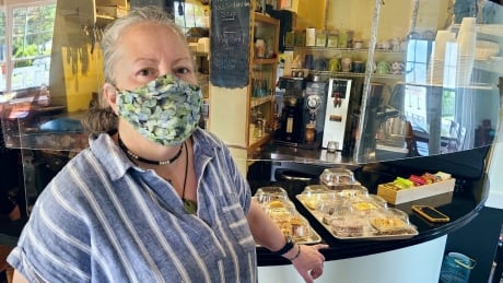 Pam McNeill says while it's 'hectic,' her cafe staff have figured out a way to work alongside the Soaring Crane Sushi team for the hour that they crossover in their small kitchen. pam mcneill cafe