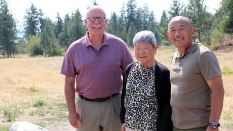 Taken in Mar land used for dog park Adrian Marr, right, and his mother Ann Marr with West Kelowna Mayor Gord Milsom
