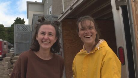 Jessica Farrer and Abby Kierstead tend to the Fosters Fresh Vegetables stall at Fredericton Boyce Farmers' Market and say the province's shift to the green phase is welcome.
Boyce Farmers' Market NB green