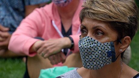 Coun. Jyoti Gondek listens during a protest against the Alberta government's decision to remove COVID-19 health measures in Calgary on Monday, Aug. 2, 2021. Jyoti Gondek