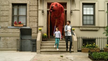 Darby Camp, left, and Jack Whitehall star in Clifford the Big Red Dog from Paramount Pictures are shown in this handout image. The release of Clifford the Big Red Dog has been postponed in Canada and distributors say the family adventure will no longer be in the Toronto International Film Festival. FILM-Clifford-Postponement 20210804